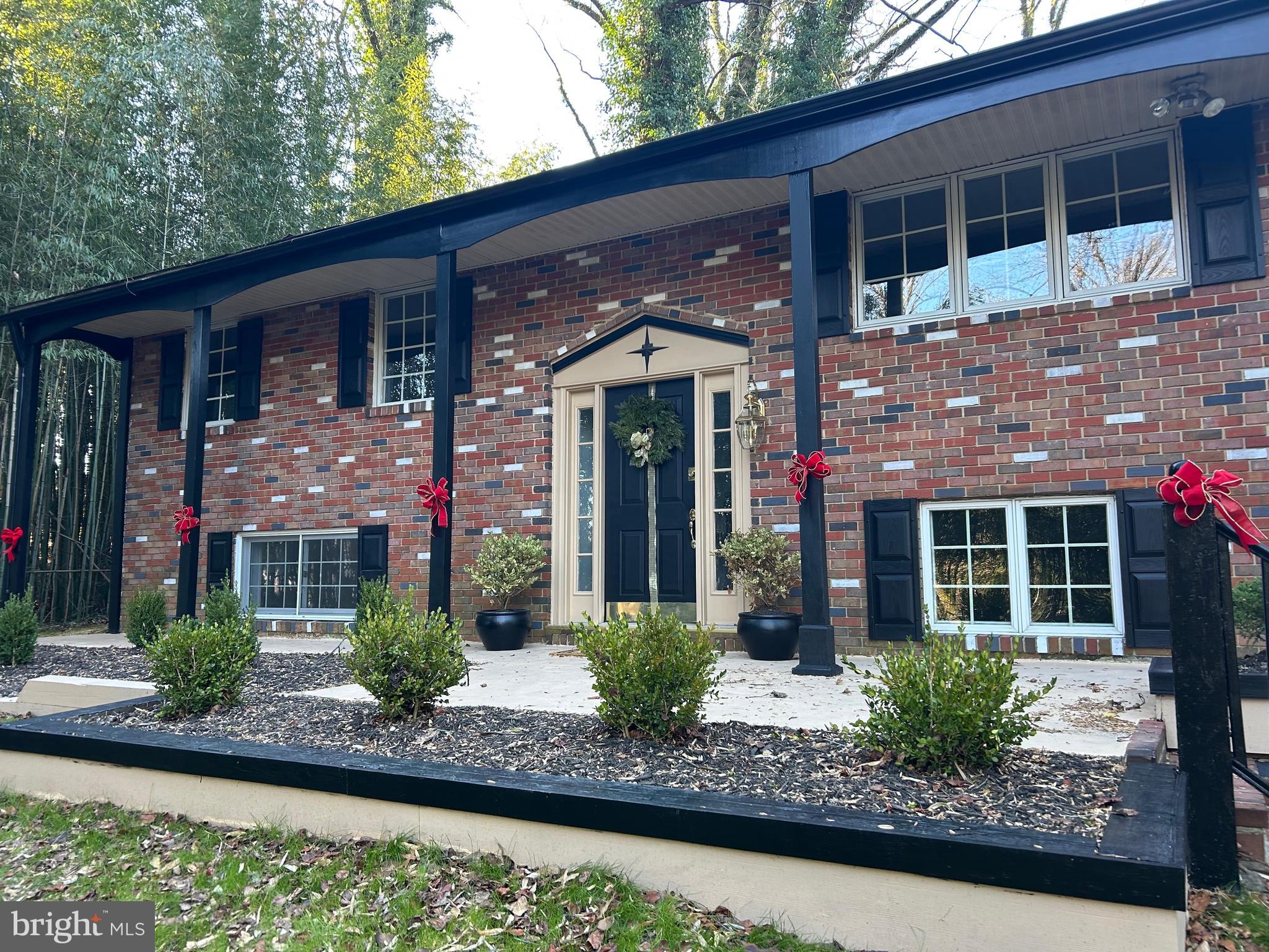 1350 Ritchie Highway Arnold, MD 21012 - Photo 3 of 30 a front view of a house with garden