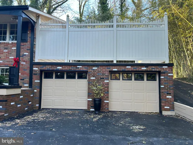 a view of a house with a garage