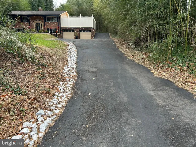 a view of a back yard of a house
