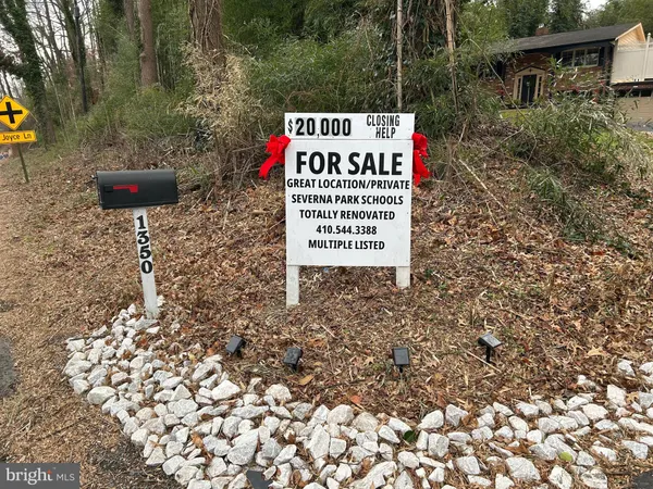 a sign on the side of the road