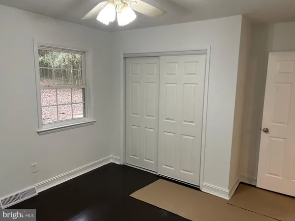 an empty room with windows