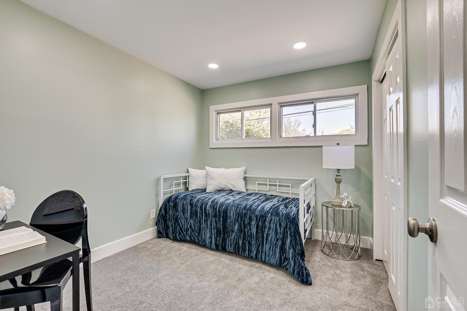 16 Fordham Road Old Bridge, NJ 08859 - Photo 23 of 33 a bedroom with a bed and a dresser next to a window