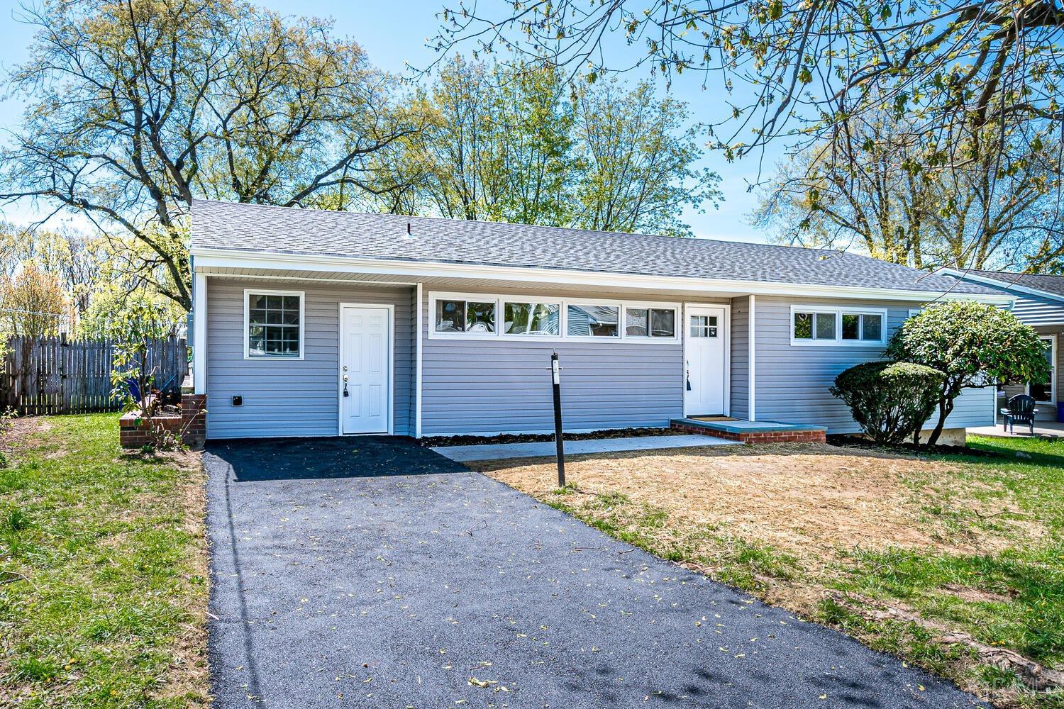 16 Fordham Road Old Bridge, NJ 08859 - Photo 3 of 33 a view of a house with a yard and potted plants