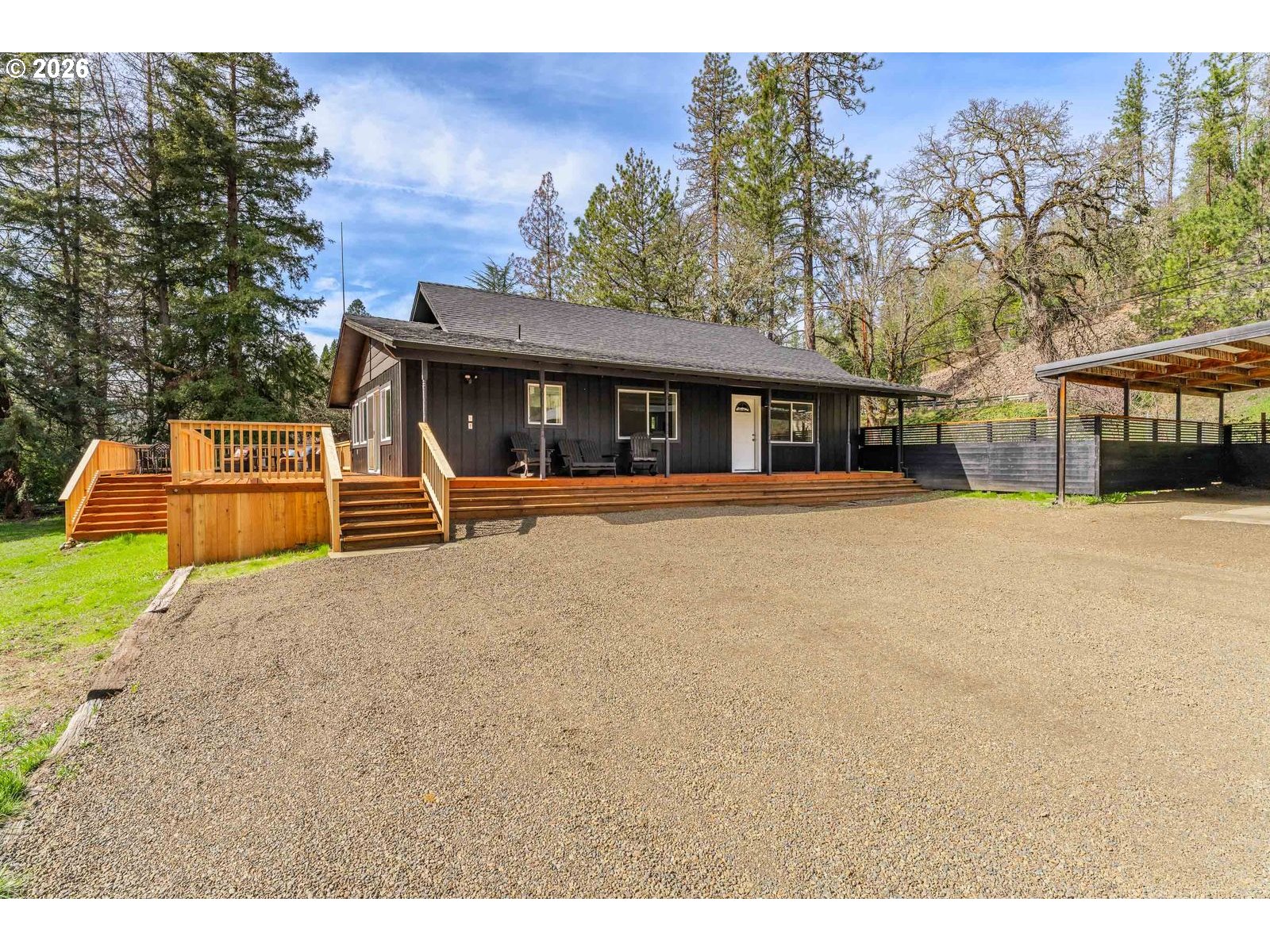 24990 Highway 62 Trail, OR 97541 - Photo 18 of 23 a front view of a house with a yard