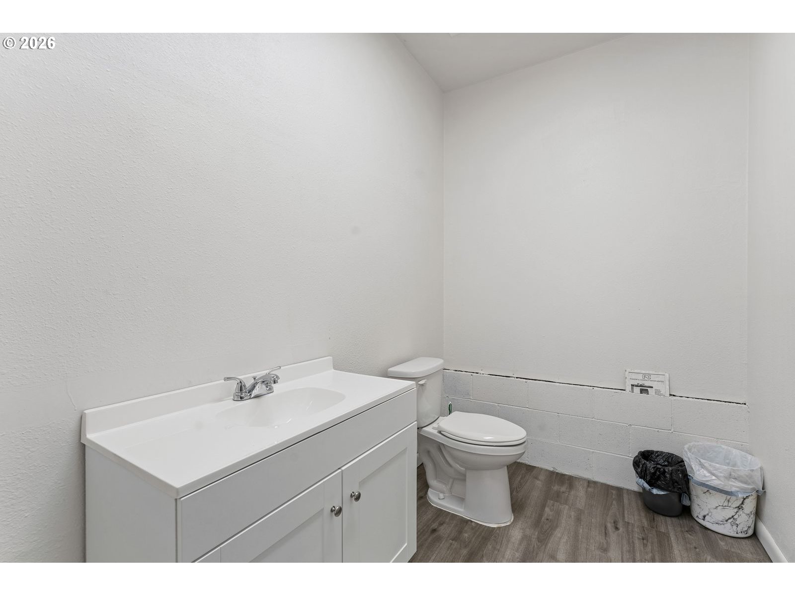 24990 Highway 62 Trail, OR 97541 - Photo 21 of 23 a bathroom with a sink a toilet and a mirror