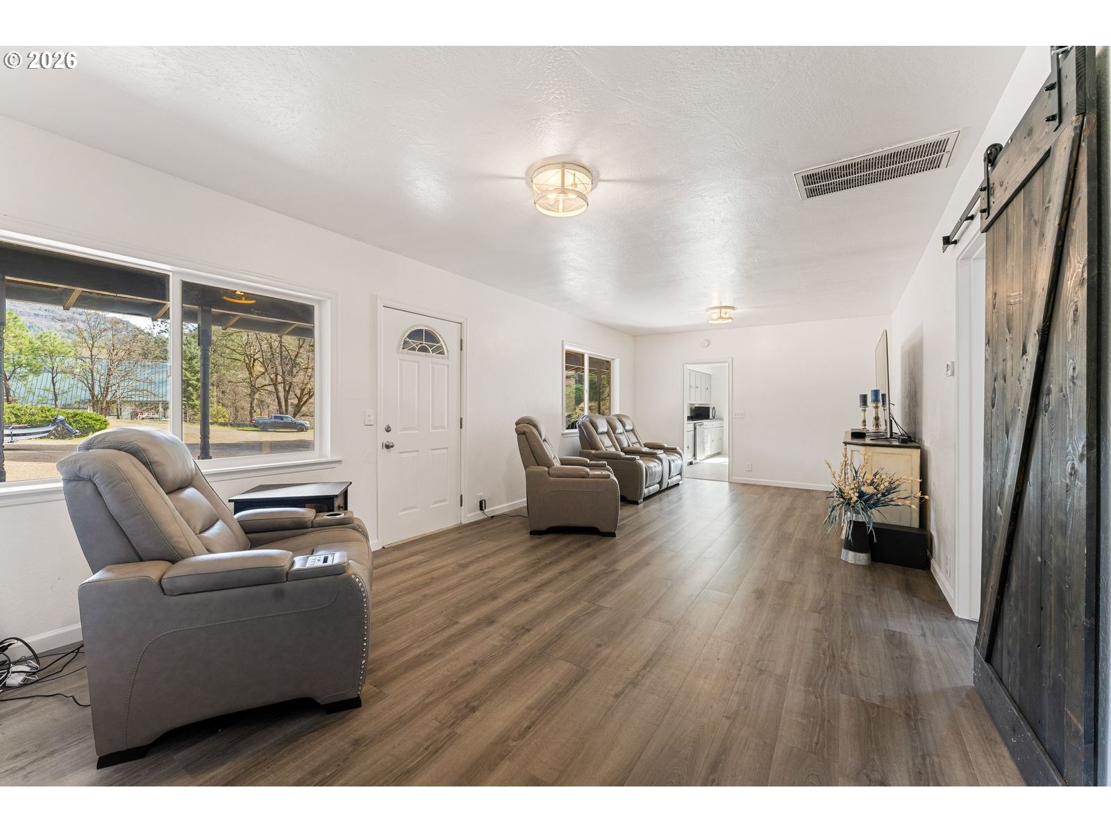 24990 Highway 62 Trail, OR 97541 - Photo 6 of 23 a living room with furniture and a wooden floor