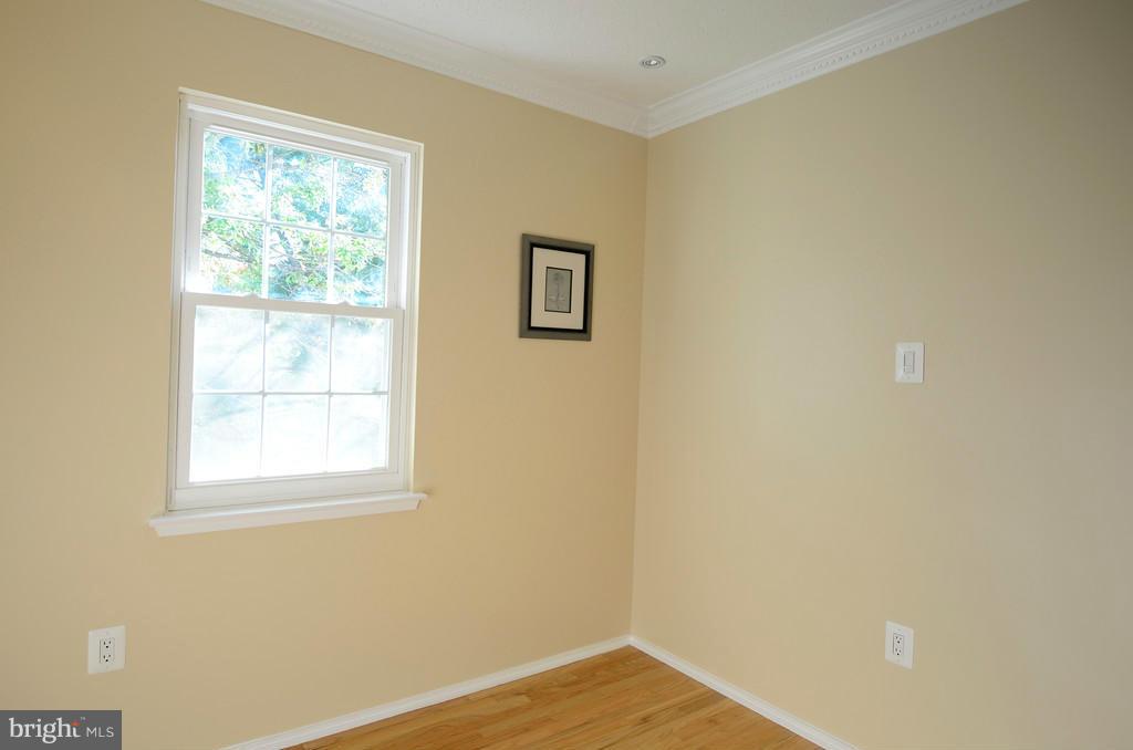 2330 Hunters Square Court Reston, VA 20191 - Photo 21 of 30 a view of a small space with wooden floor and a window