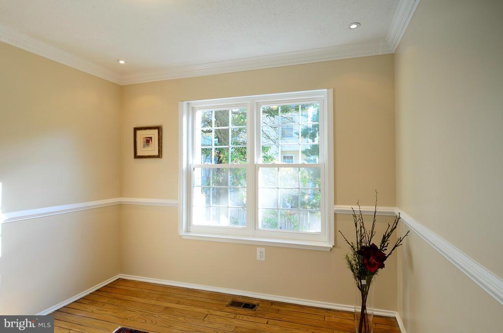 2330 Hunters Square Court Reston, VA 20191 - Photo 7 of 30 a view of a room with a window and wooden floor