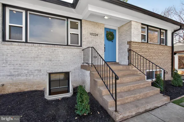 a view of a house with wooden floor and a stairs