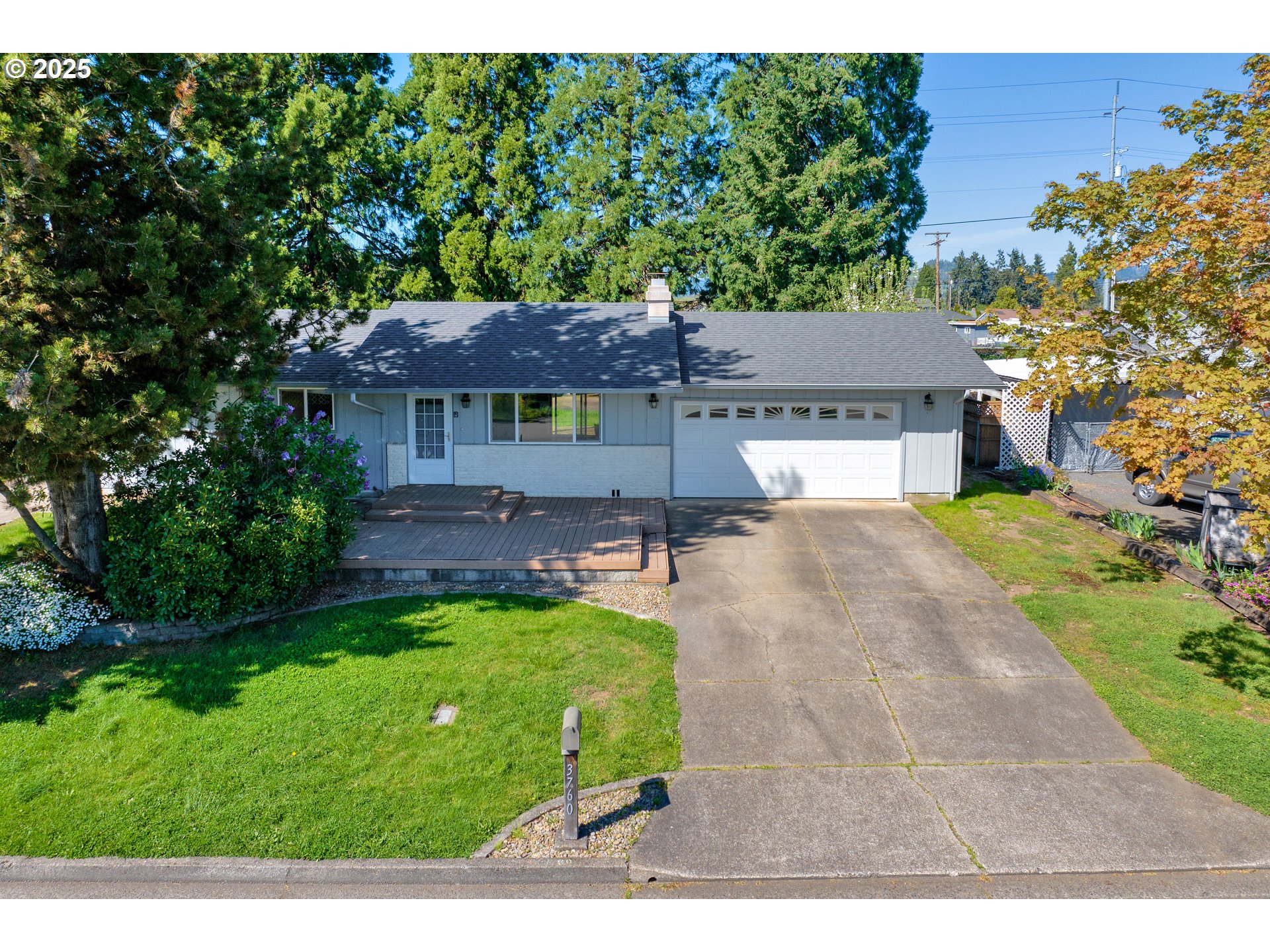 3760 Cherokee Drive Springfield, OR 97478 - Photo 2 of 42 a house view with a garden space