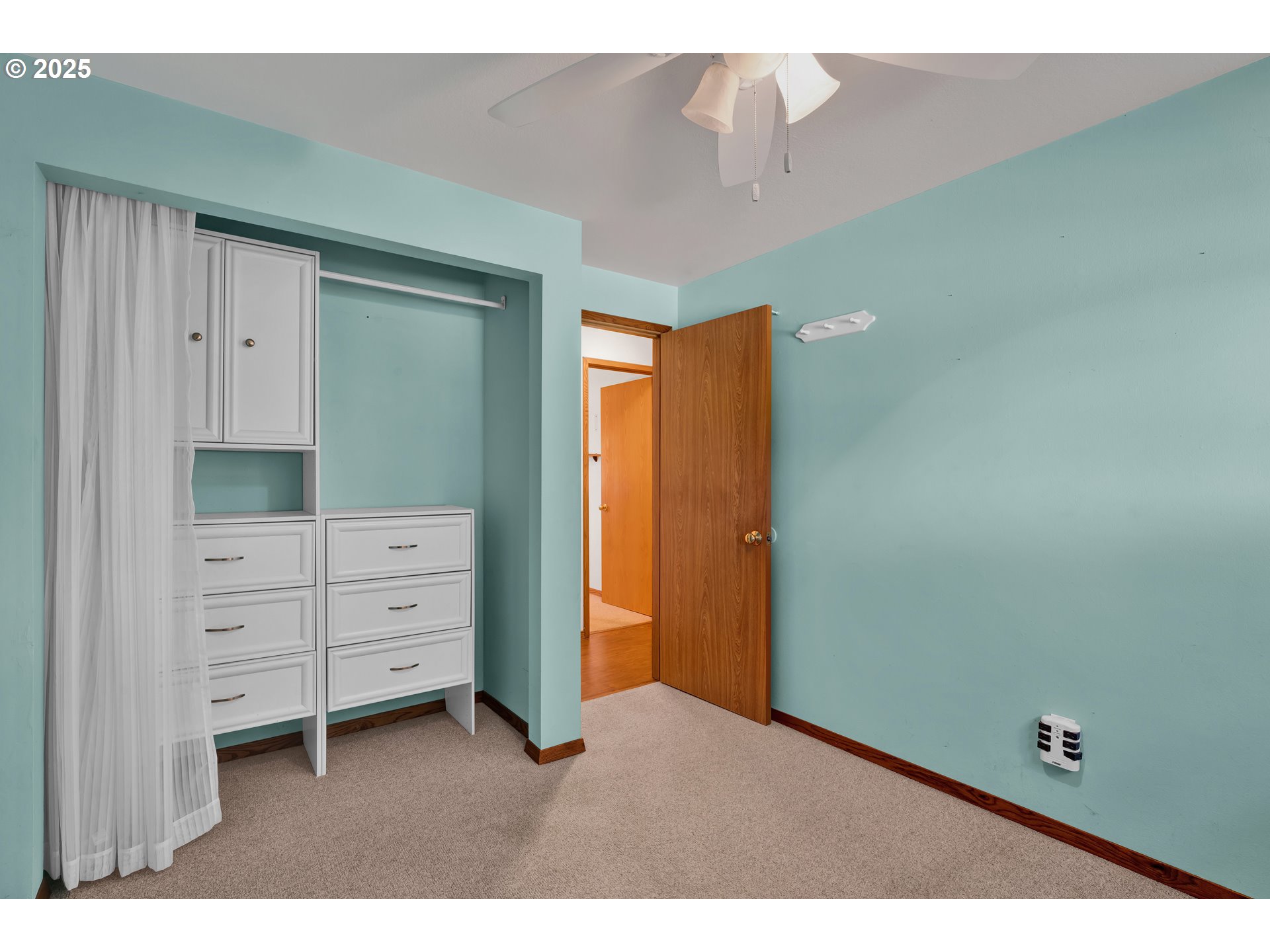 3760 Cherokee Drive Springfield, OR 97478 - Photo 22 of 42 a bedroom with a dresser and window