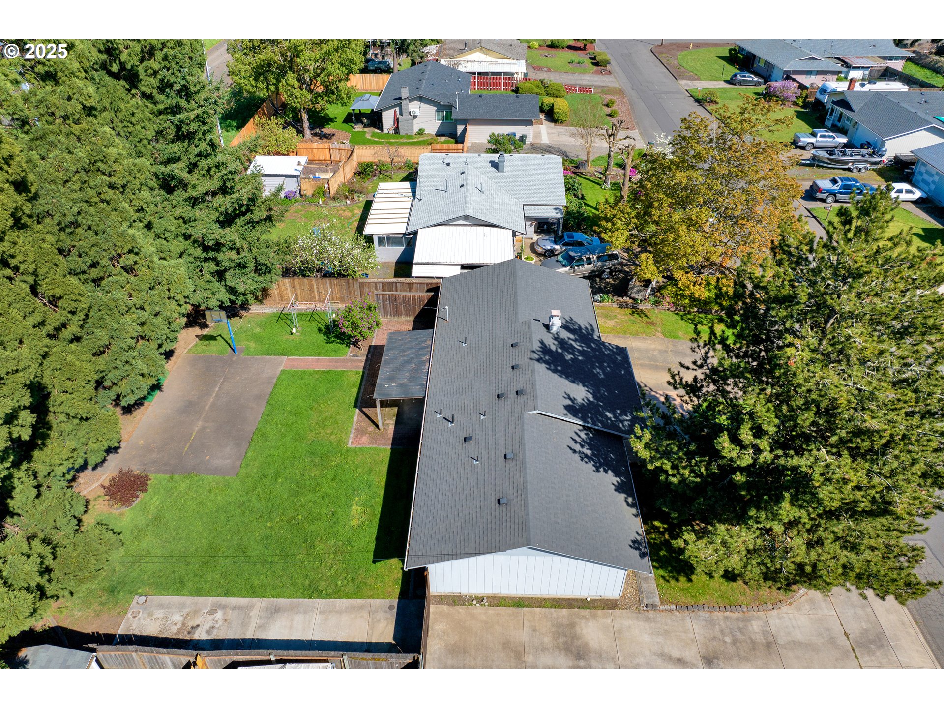 3760 Cherokee Drive Springfield, OR 97478 - Photo 40 of 42 an aerial view of residential houses with outdoor space