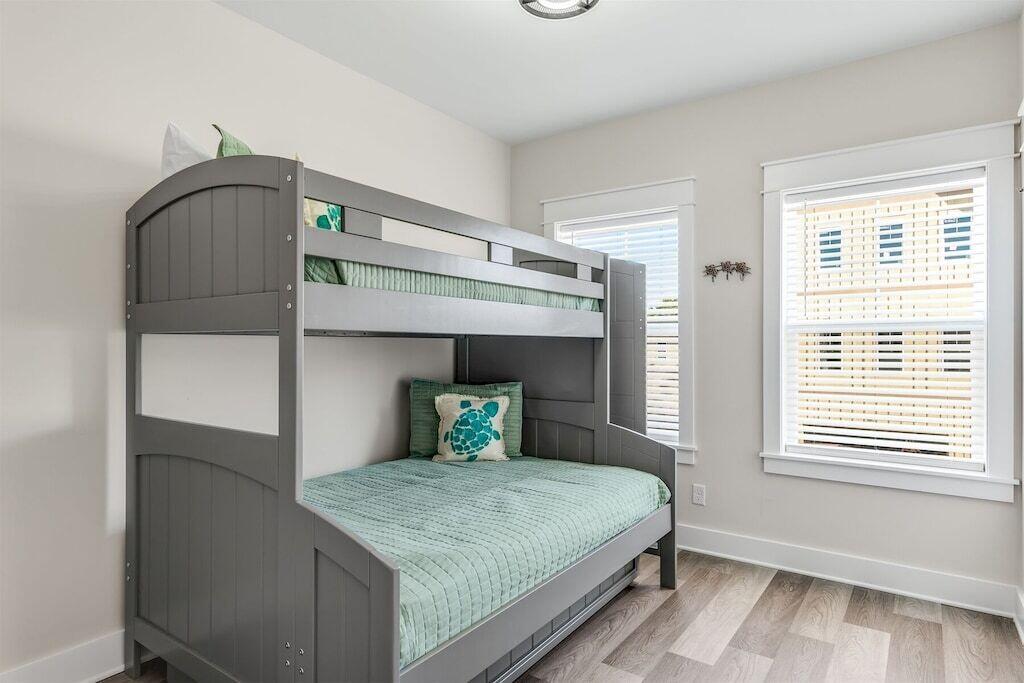 24 Beach View Dr Inlet Beach Inlet Beach, FL 32461 - Photo 12 of 27 a bedroom with a bed and a window