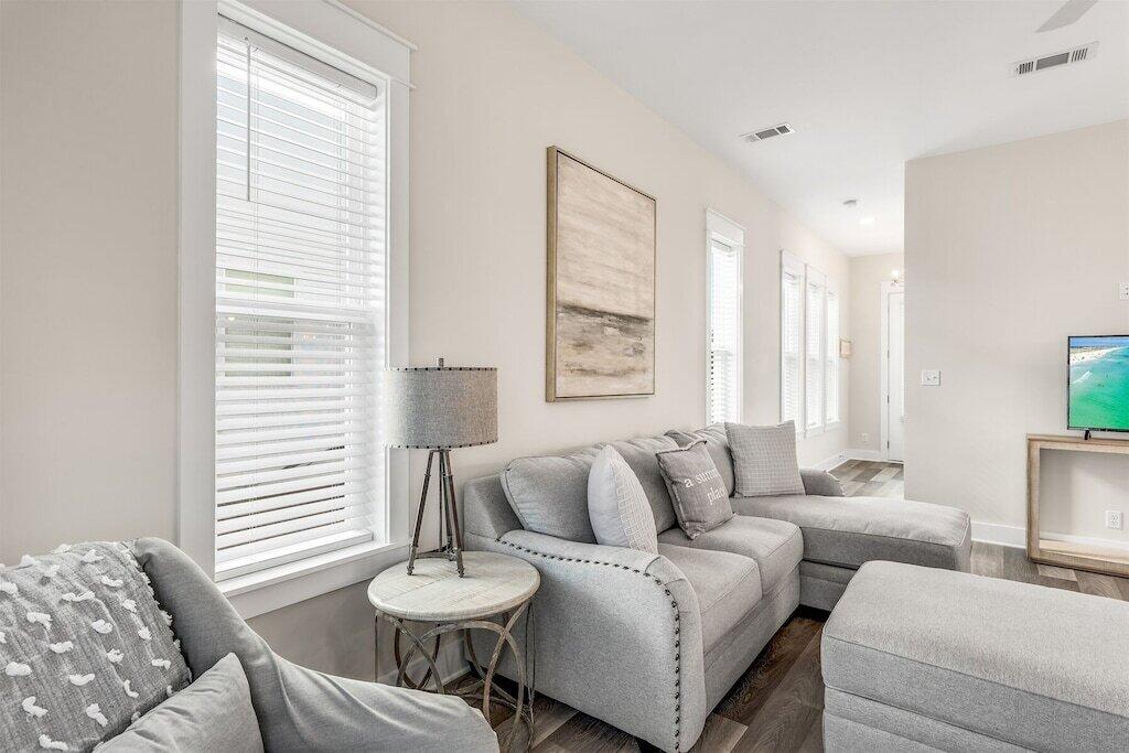 24 Beach View Dr Inlet Beach Inlet Beach, FL 32461 - Photo 7 of 27 a living room with furniture and a large window