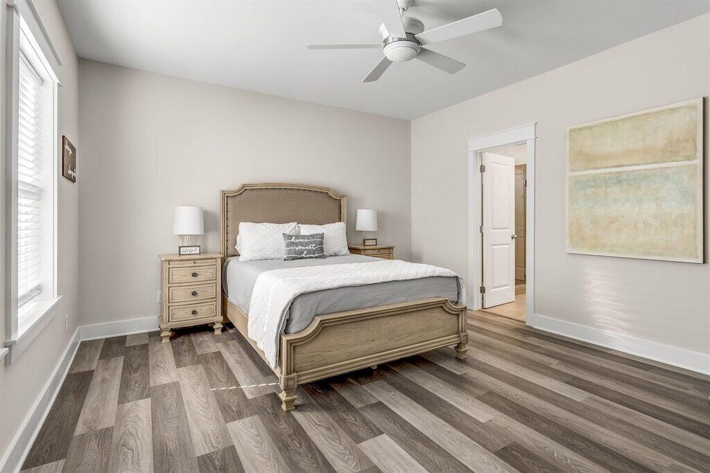 24 Beach View Dr Inlet Beach Inlet Beach, FL 32461 - Photo 8 of 27 a bedroom with a large bed and a window