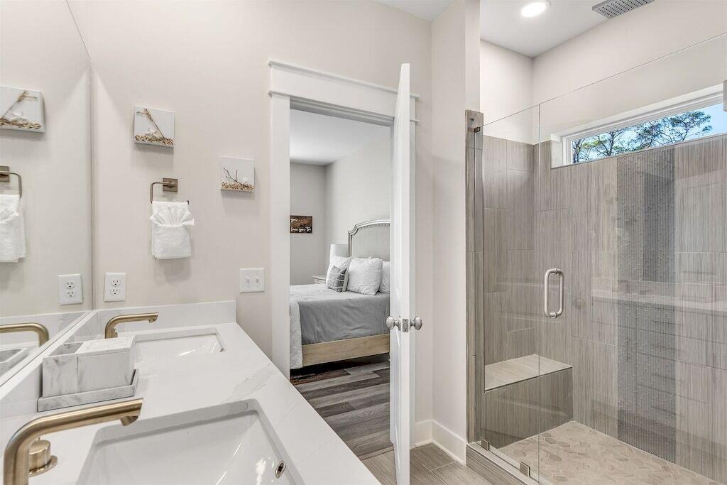 24 Beach View Dr Inlet Beach Inlet Beach, FL 32461 - Photo 10 of 27 a bathroom with a sink a toilet and shower