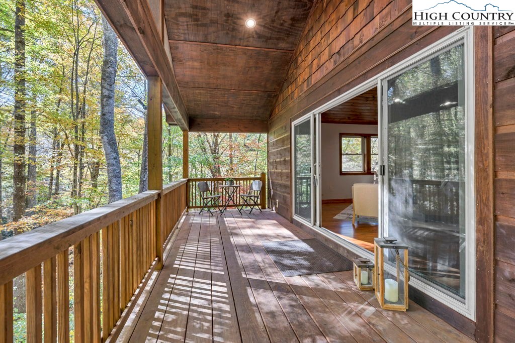 359 Sorrento Falls Road Blowing Rock, NC 28605 - Photo 3 of 46 a view of balcony with wooden floor