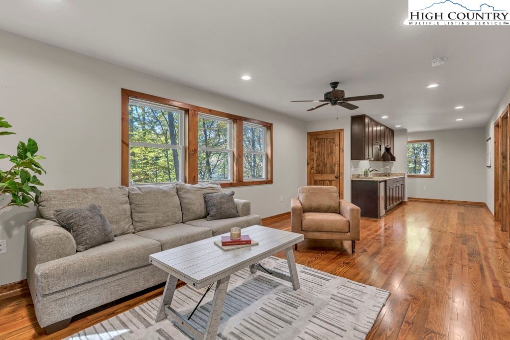 359 Sorrento Falls Road Blowing Rock, NC 28605 - Photo 33 of 46 a living room with furniture and wooden floor