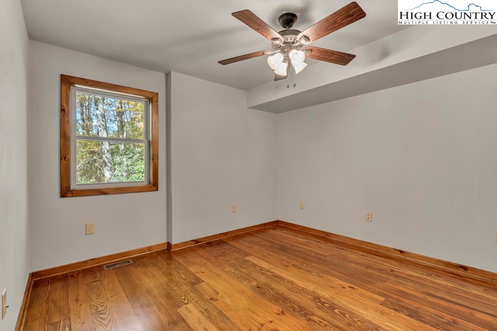 359 Sorrento Falls Road Blowing Rock, NC 28605 - Photo 37 of 46 an empty room with a window