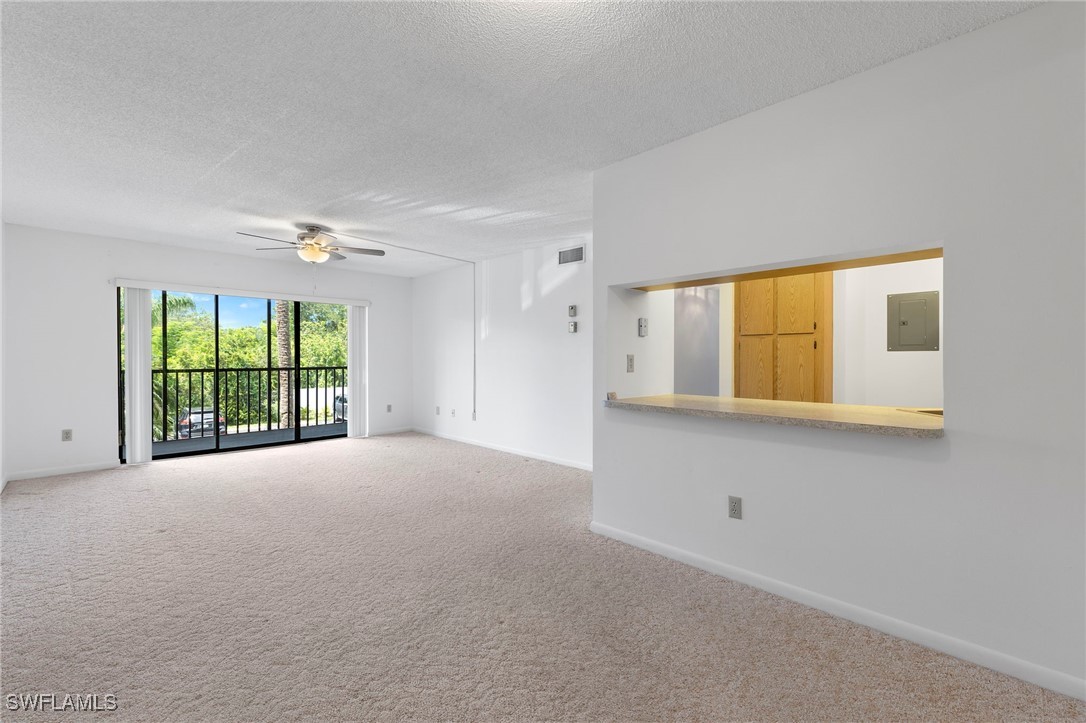 9970 Sailview Court, Unit 9 Fort Myers, FL 33905 - Photo 11 of 20 a view of an empty room with a window