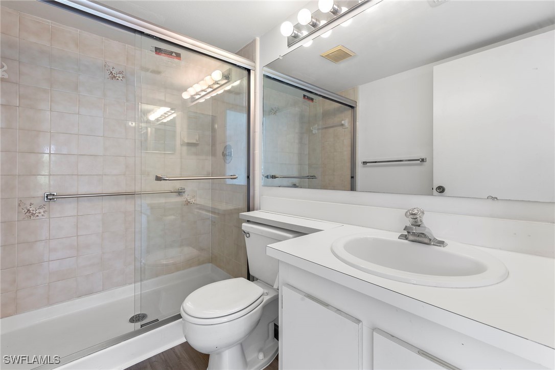 9970 Sailview Court, Unit 9 Fort Myers, FL 33905 - Photo 15 of 20 a bathroom with a sink toilet and shower