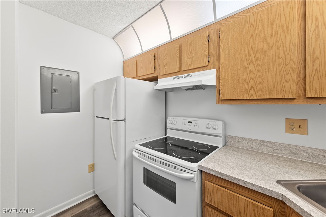 9970 Sailview Court, Unit 9 Fort Myers, FL 33905 - Photo 8 of 20 a utility room with dryer and washer