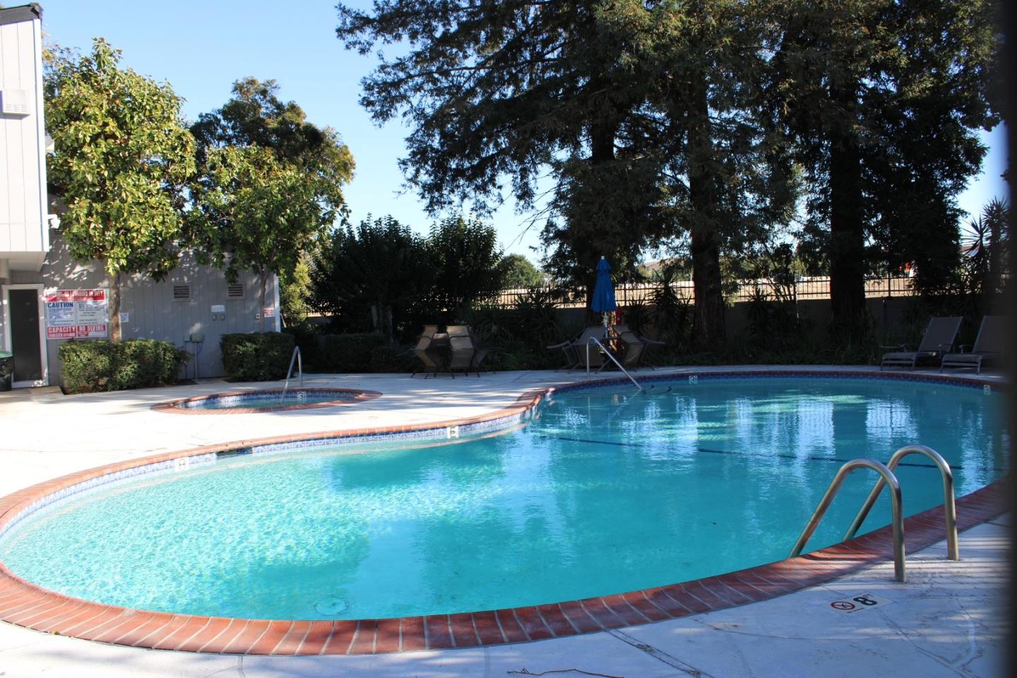 2298 Almaden Road, Unit B San Jose, CA 95125 - Photo 21 of 21 a view of a swimming pool with a sitting space