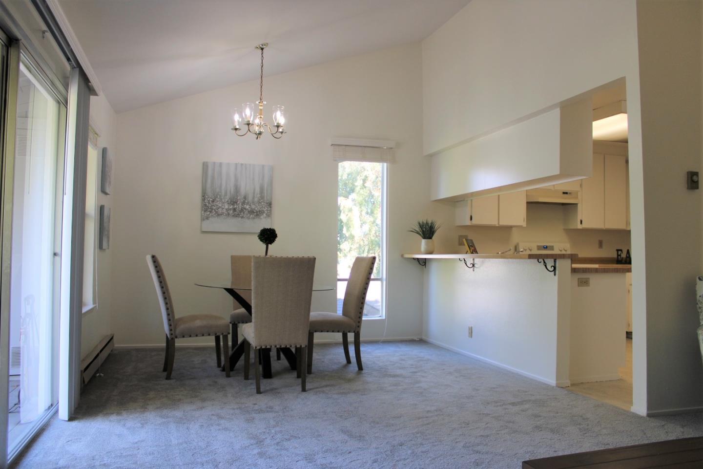 2298 Almaden Road, Unit B San Jose, CA 95125 - Photo 7 of 21 a view of a dining room with furniture and window