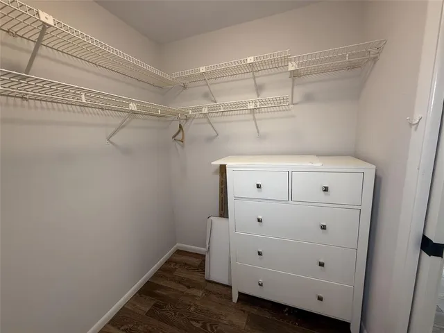 a view of an empty walk in closet