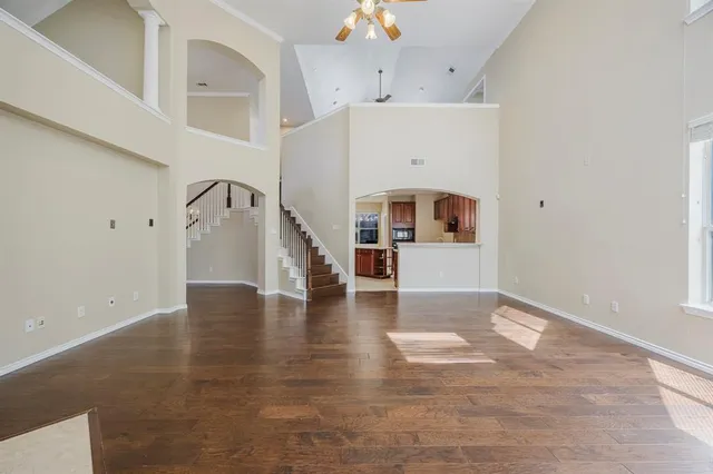 a view of a livingroom with wooden floor
