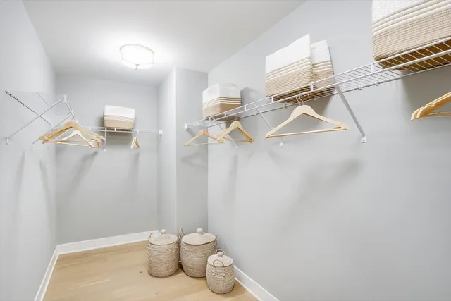 a bathroom with a double vanity sink mirror double and shower