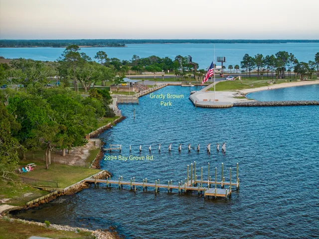 an aerial view of a house with outdoor space