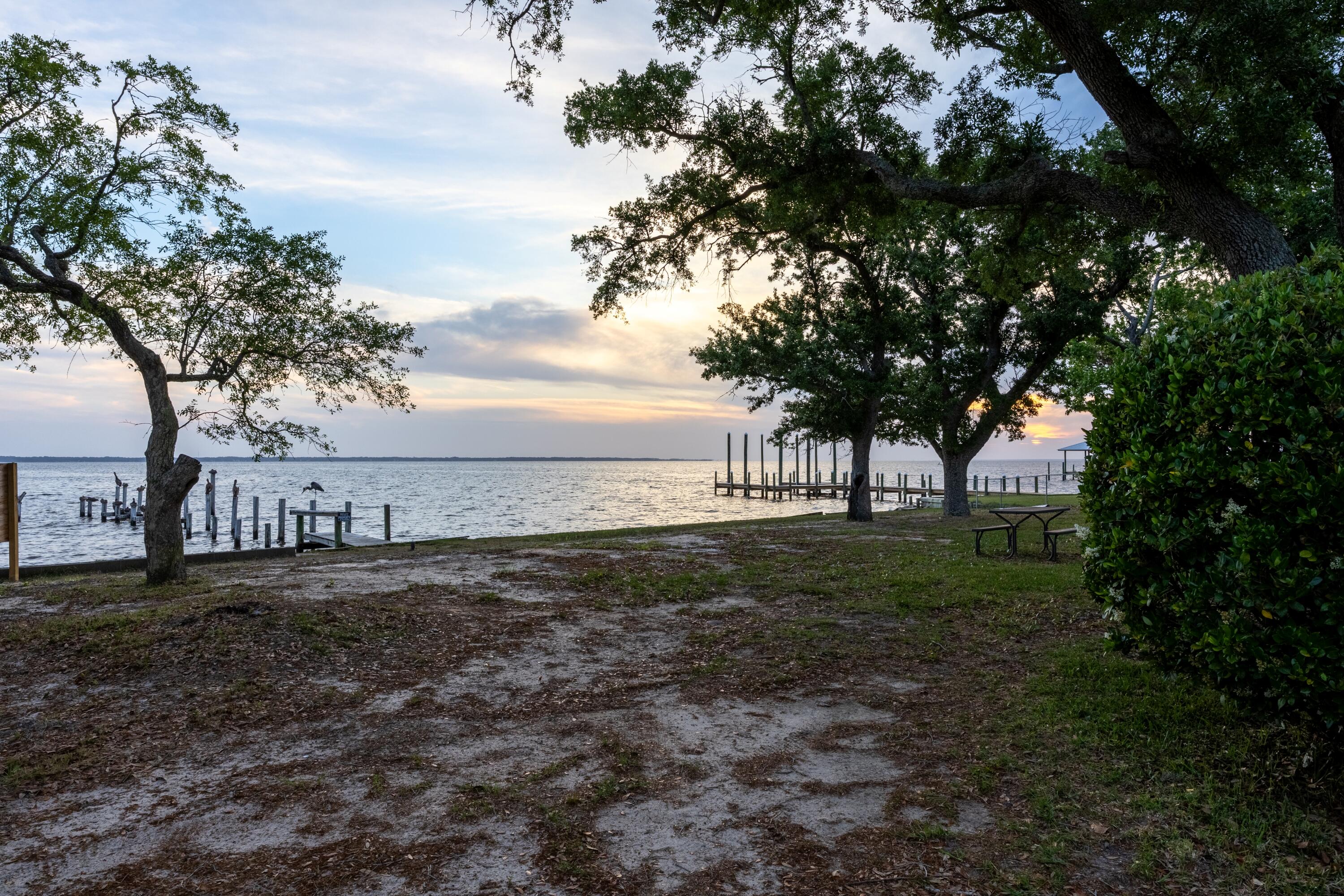 2894 Bay Grove Road Freeport, FL 32439 - Photo 23 of 29 a view of a yard with an trees