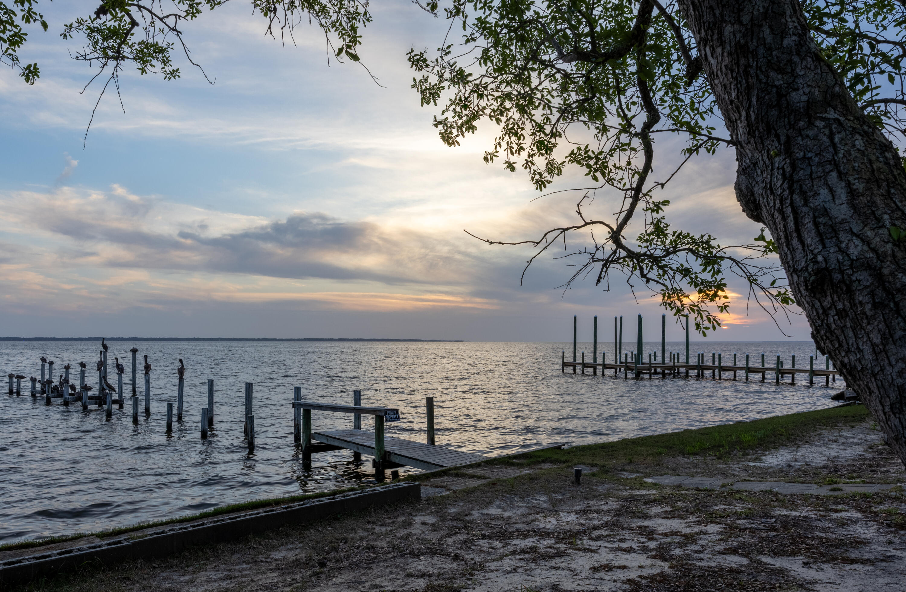 2894 Bay Grove Road Freeport, FL 32439 - Photo 27 of 29 a view of a terrace with trees