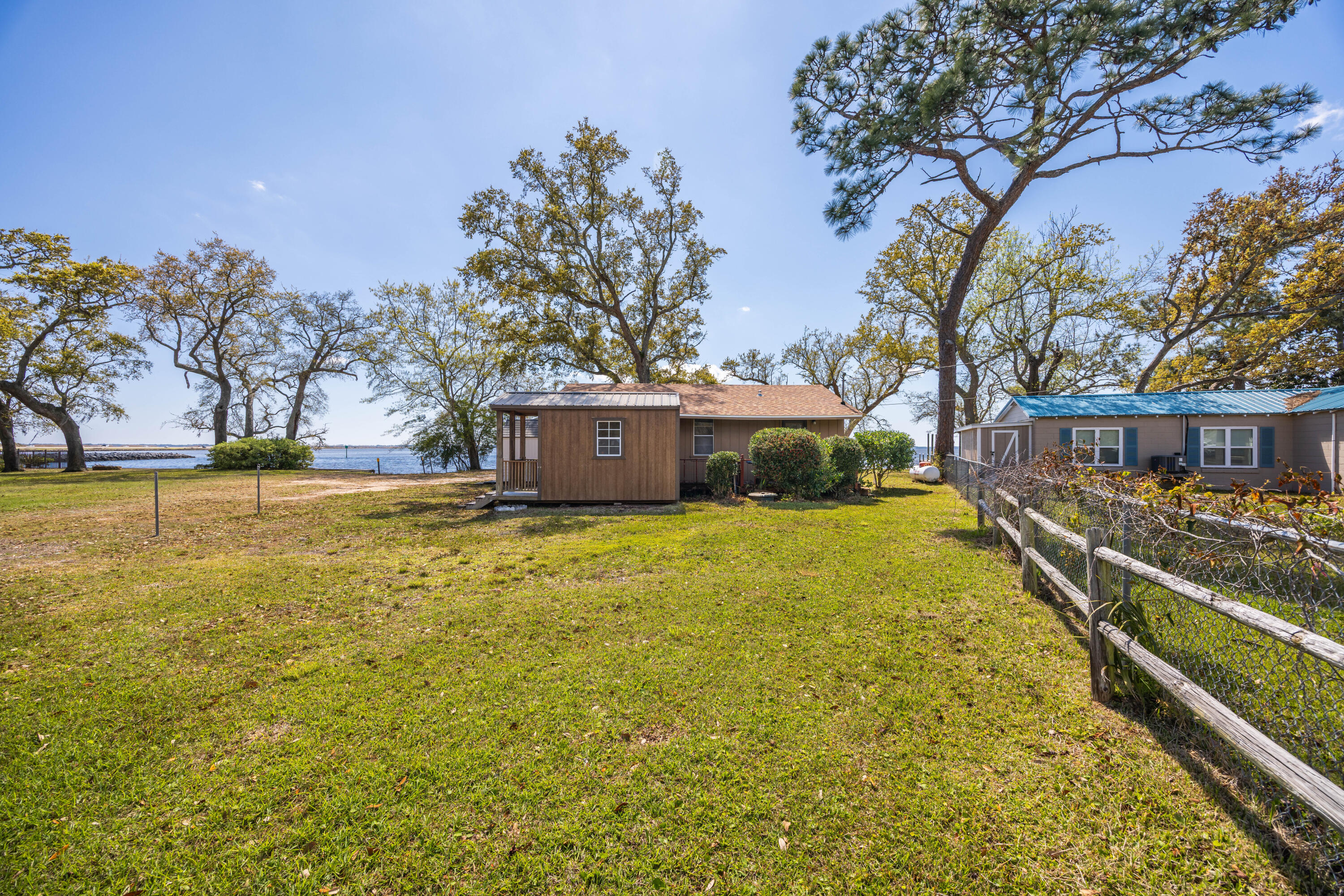 2894 Bay Grove Road Freeport, FL 32439 - Photo 10 of 29 a front view of house with yard and trees