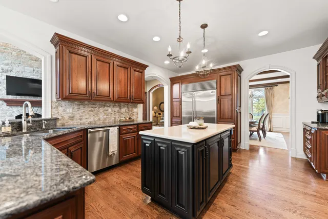 a bedroom with bed and windows