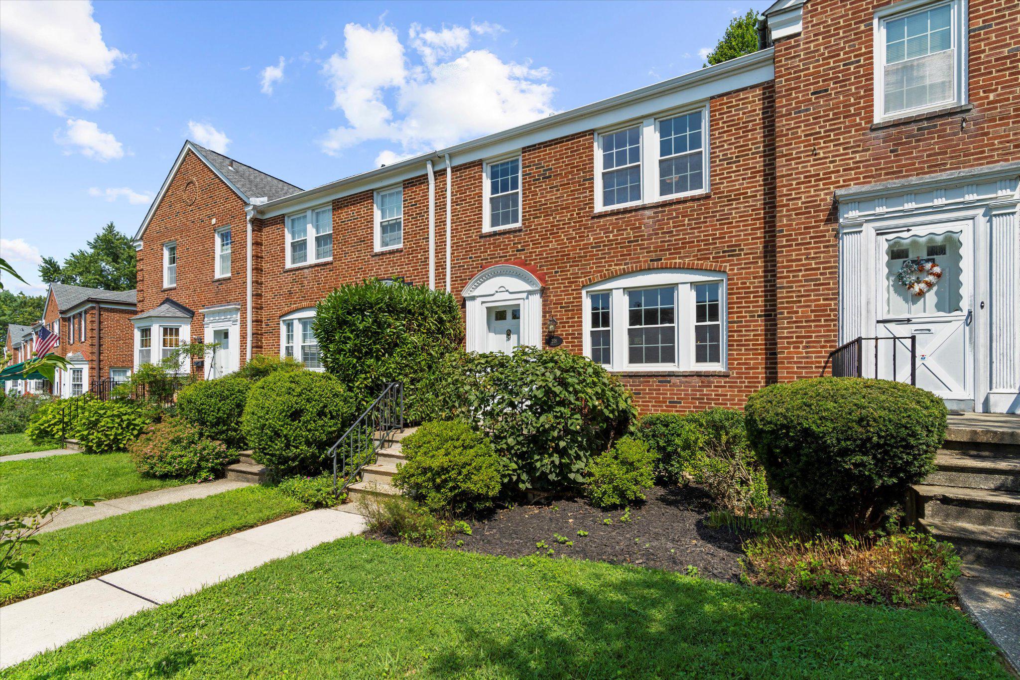 218 Blenheim Road Baltimore, MD 21212 - Photo 2 of 31 a front view of a house with a yard