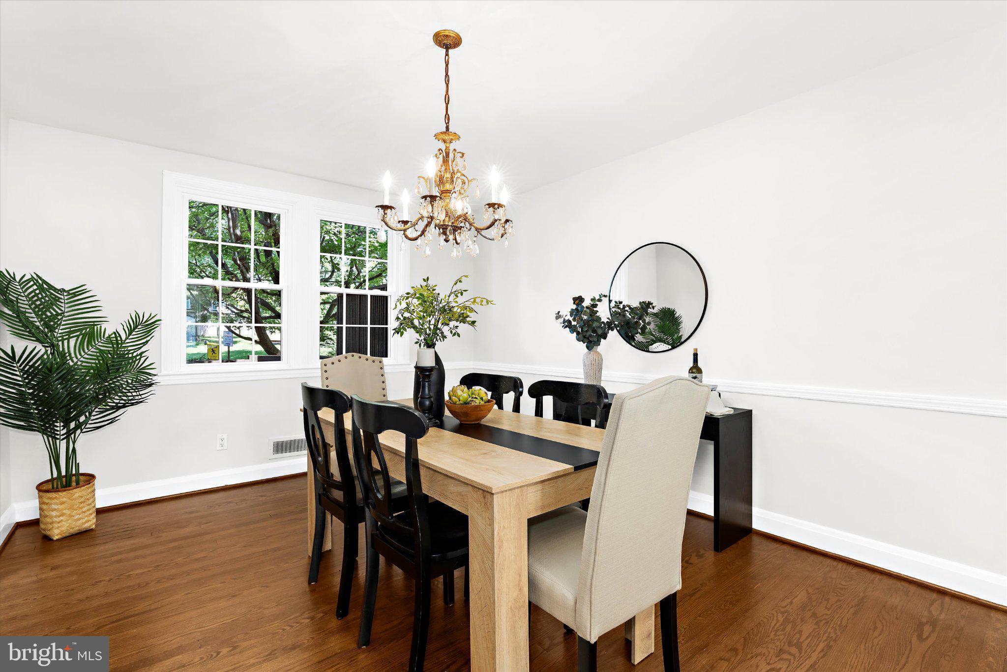 218 Blenheim Road Baltimore, MD 21212 - Photo 9 of 31 a view of a dining room with furniture window and wooden floor