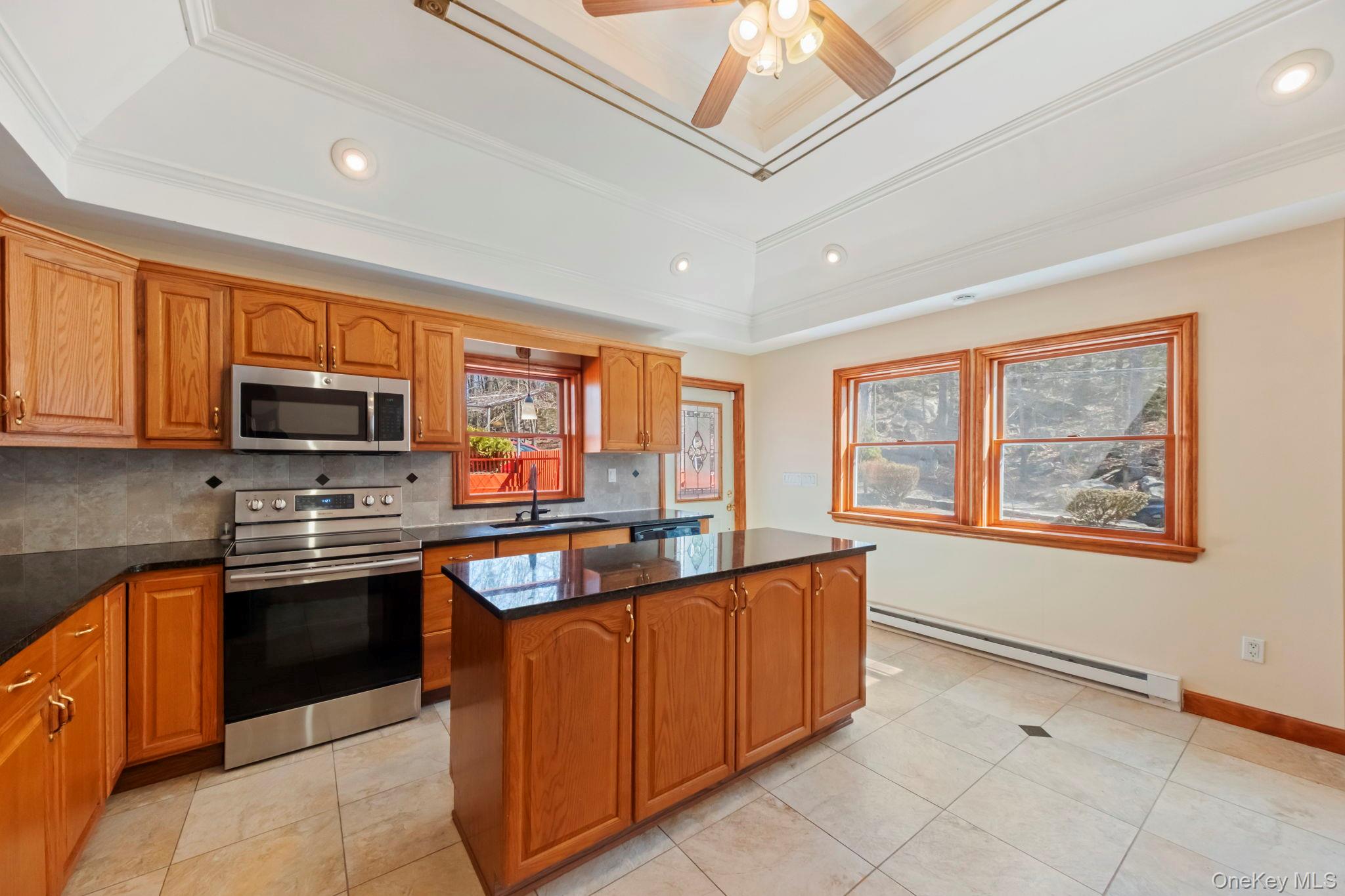 21 Jackson Road Mahopac, NY 10541 - Photo 9 of 36 Kitchen Door to Large Deck