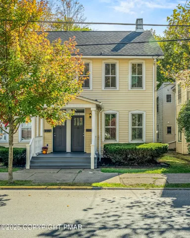 a view of a house with a swimming pool
