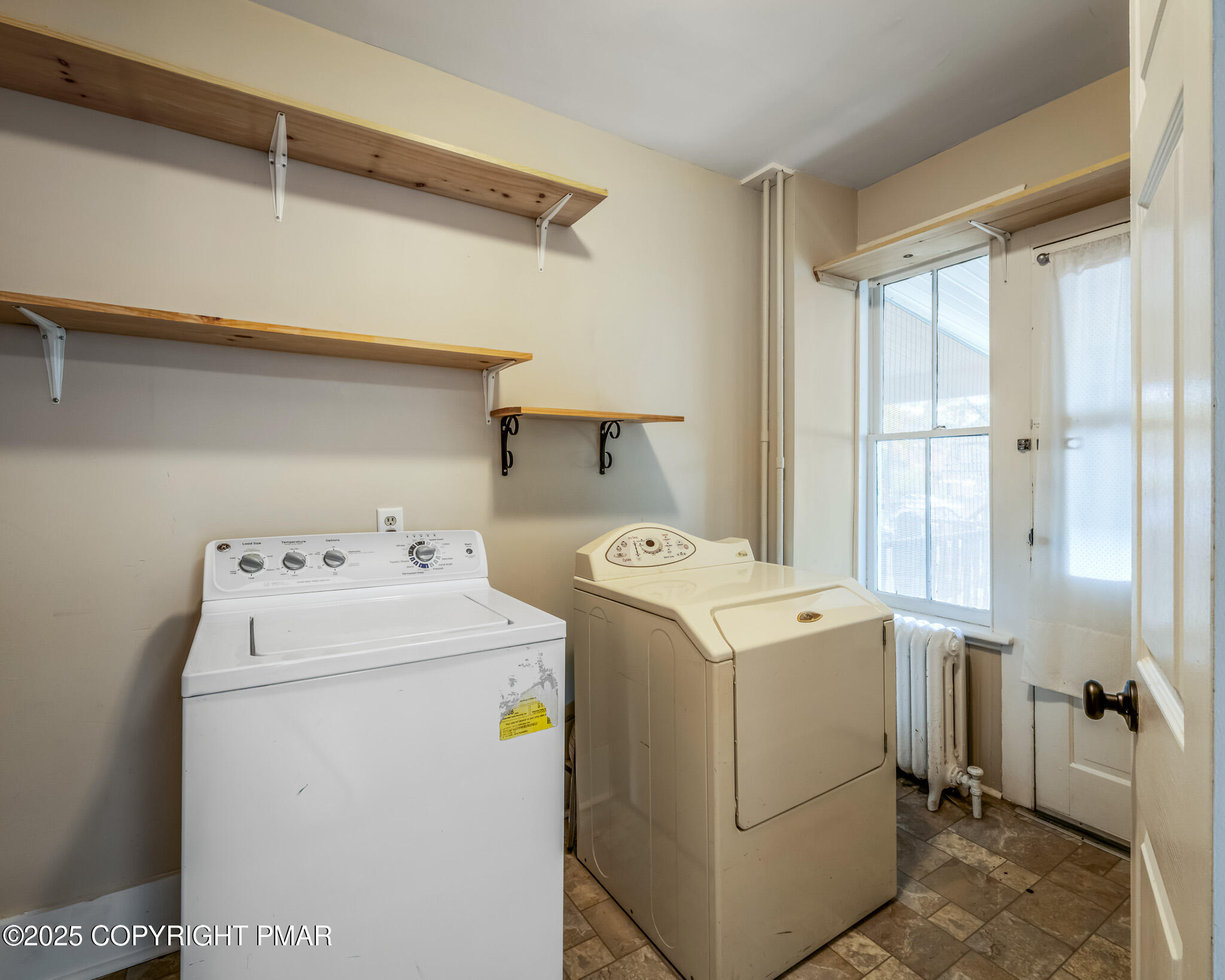 703 Scott Street Stroudsburg, PA 18360 - Photo 9 of 27 a utility room with dryer and washer