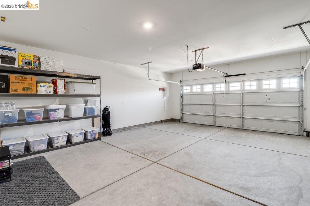 4347 Canada Way Rio Vista, CA 94571 - Photo 28 of 41 Spacious garage with light gray concrete flooring