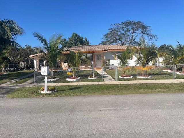11775 Southwest 173rd Terrace Miami, FL 33177 - Photo 2 of 25 Carport on the left side of the home.
