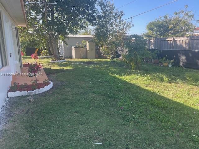11775 Southwest 173rd Terrace Miami, FL 33177 - Photo 23 of 25 Shed in back of this view behind the left side of the house and the garage.