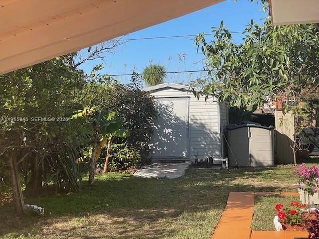 11775 Southwest 173rd Terrace Miami, FL 33177 - Photo 25 of 25 Behind carport-left side
