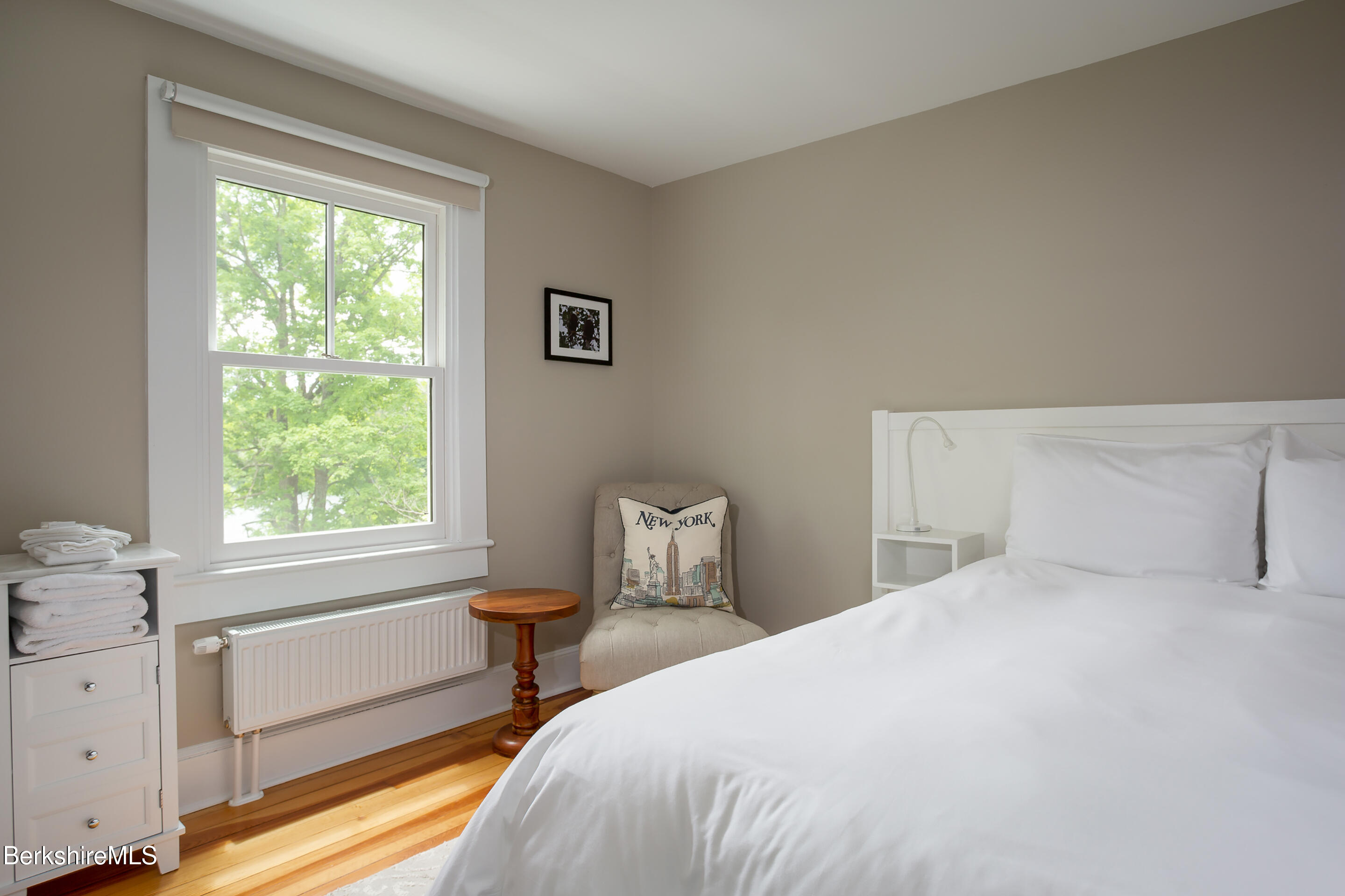 615 Laurel Street Lee, MA 01238 - Photo 15 of 20 a bedroom with a bed and a window