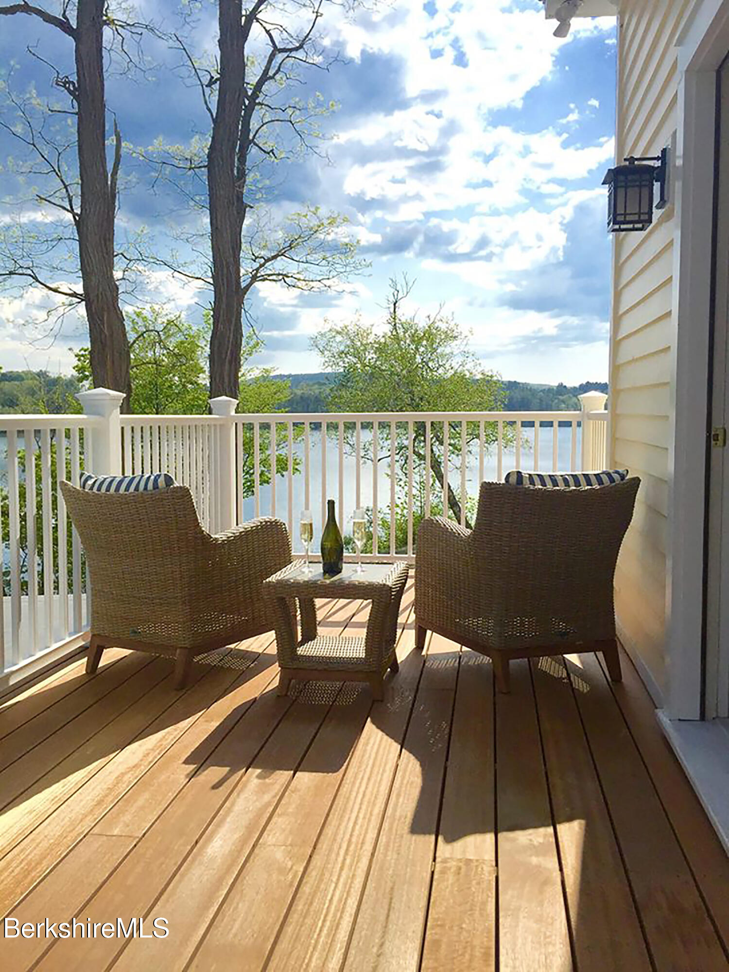 615 Laurel Street Lee, MA 01238 - Photo 19 of 20 a view of a deck with chairs and wooden floor
