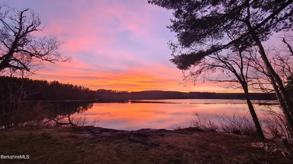 a view of mountain view with lots of trees