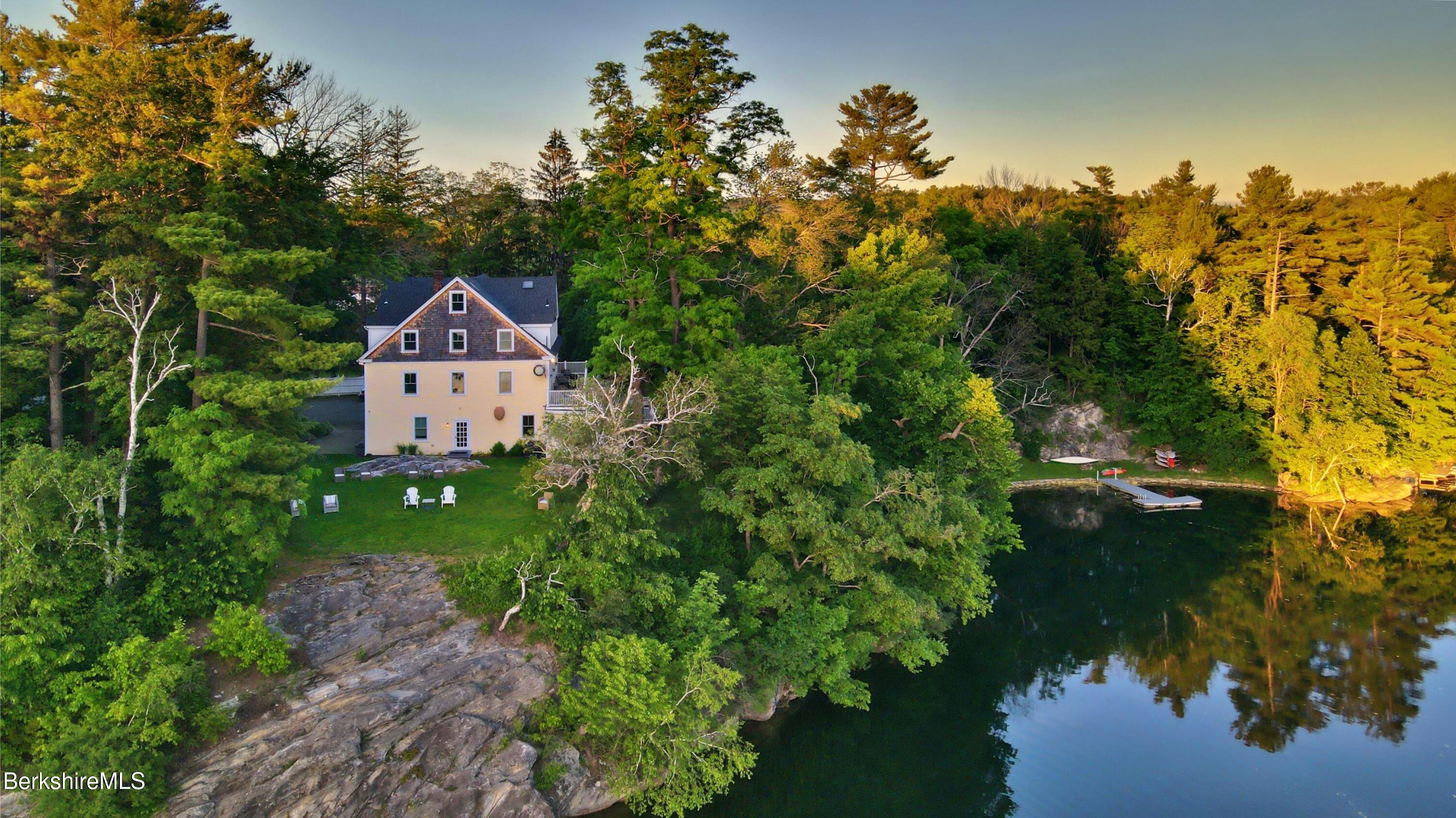 615 Laurel Street Lee, MA 01238 - Photo 4 of 20 a house view with a garden space