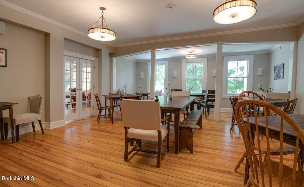 615 Laurel Street Lee, MA 01238 - Photo 7 of 20 a view of a dining room with furniture window and wooden floor
